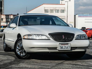 Illustration for article titled Used Car Face-Off: International Touring Coupes Edition